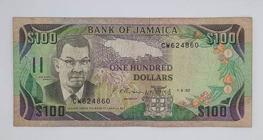 1992 Jamaica, Bank of Jamaica - 100 Jamaican Dollars Banknote P-75b Serial No. CW 624860