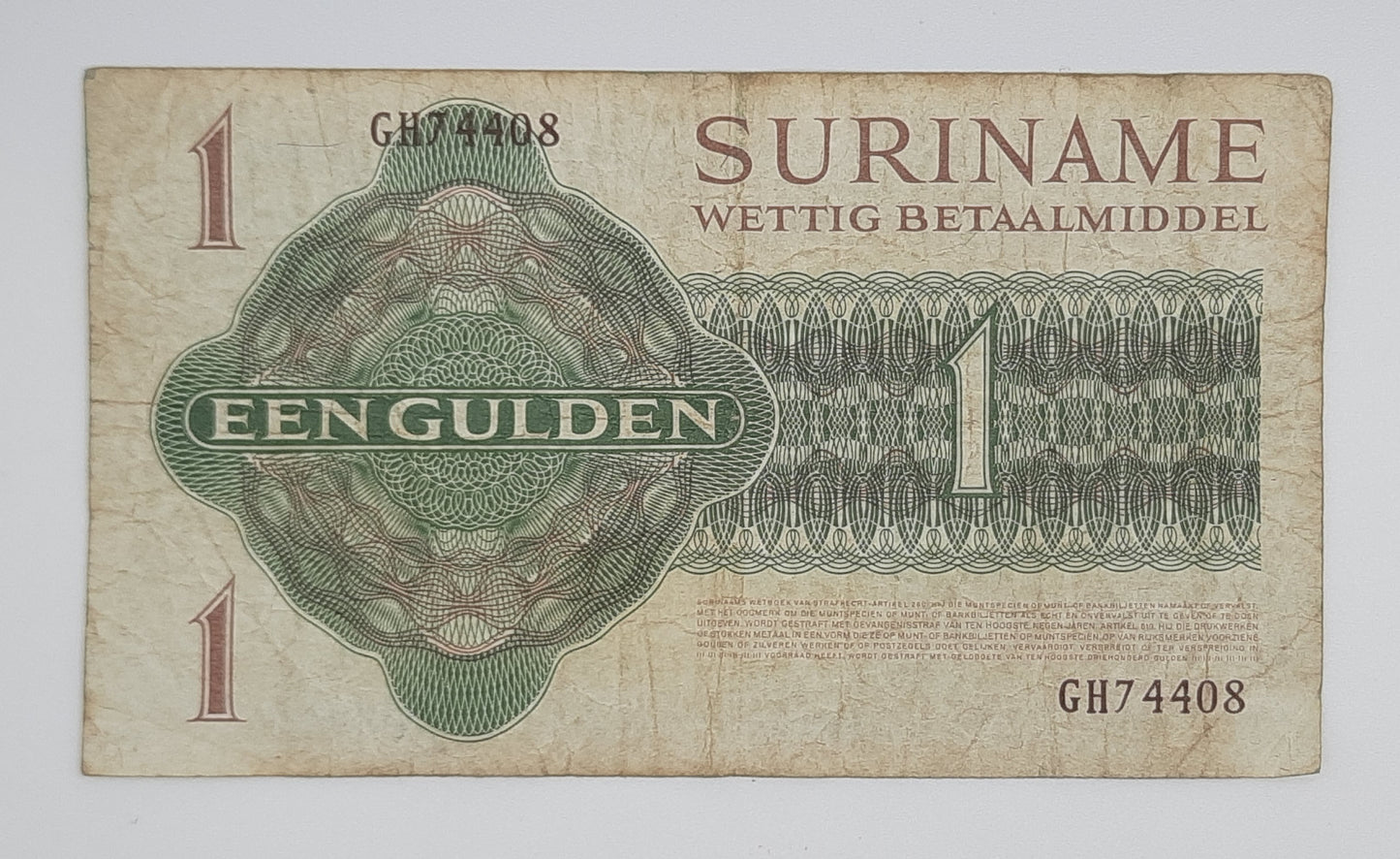 1974 Centrale Bank van Suriname - 1 Gulden Banknote P-116c Serial No. GH 74408